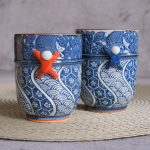 Hasamiyaki Kacho Ichijinin Climbing Man Pair His & Hers Teacups