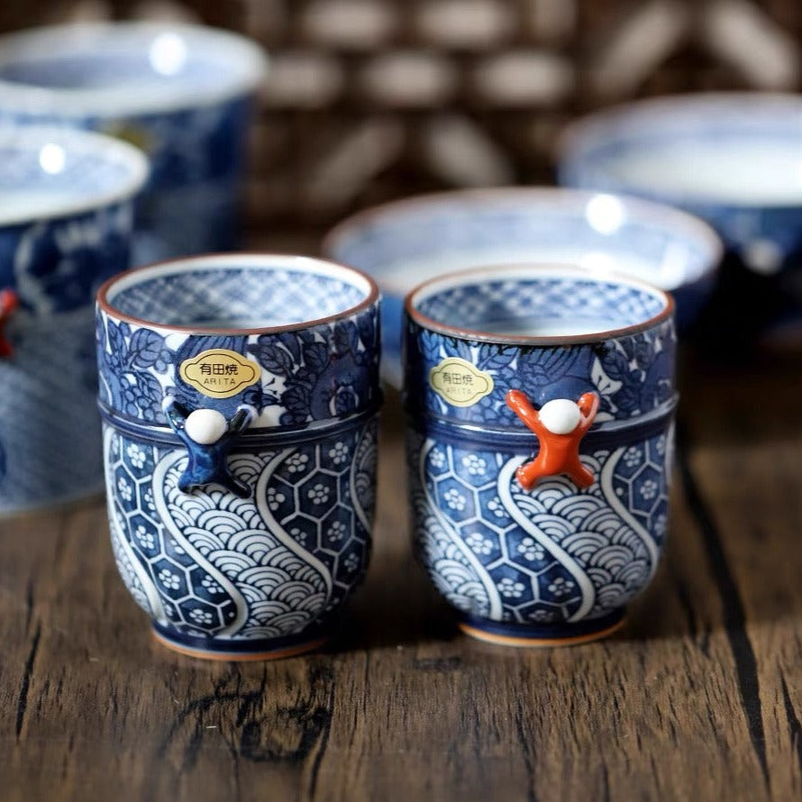 Hasamiyaki Kacho Ichijinin Climbing Man Pair His & Hers Teacups