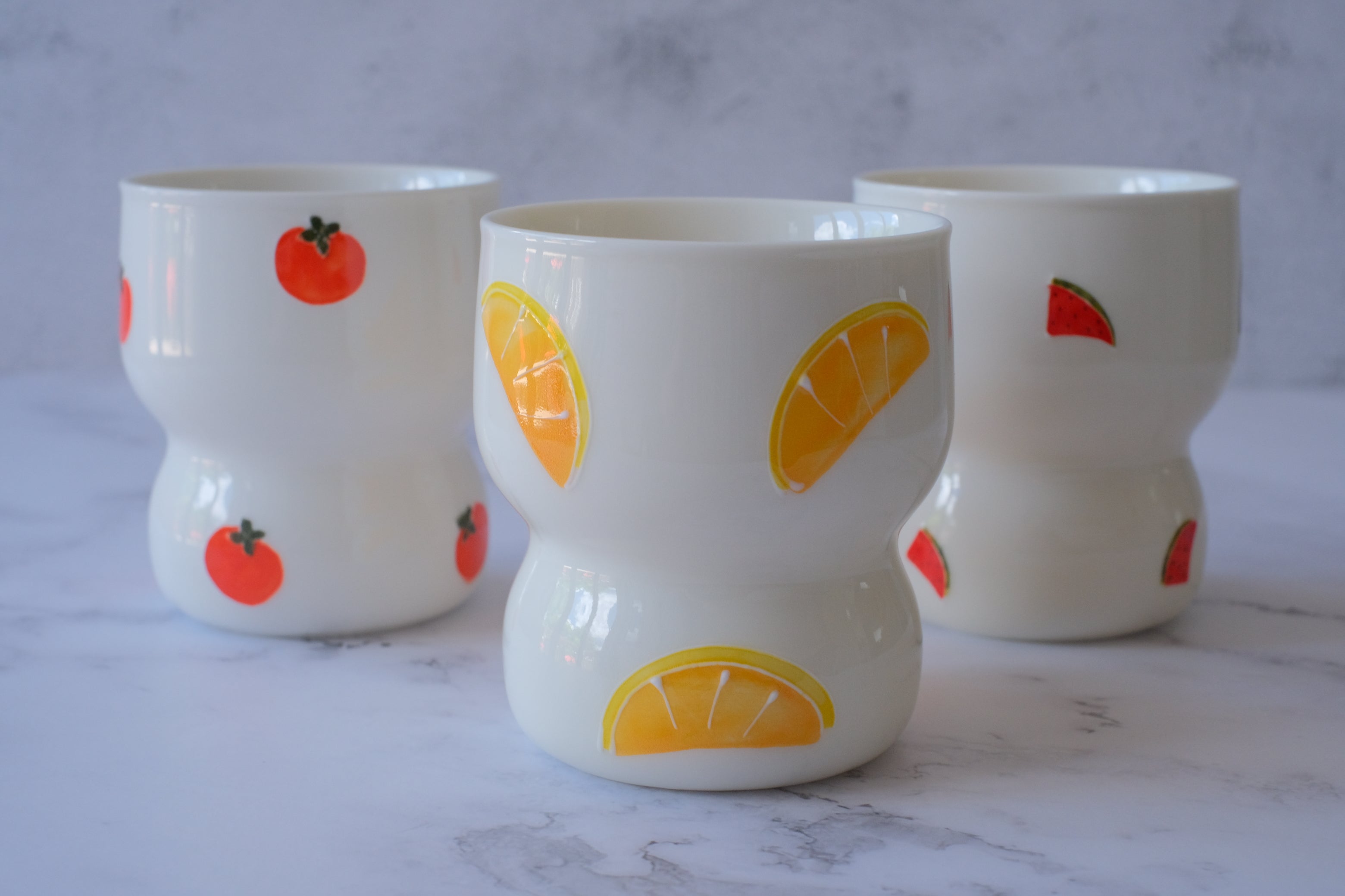 Summer Fruits Cinched Ivory Ceramic Tumbler Cup